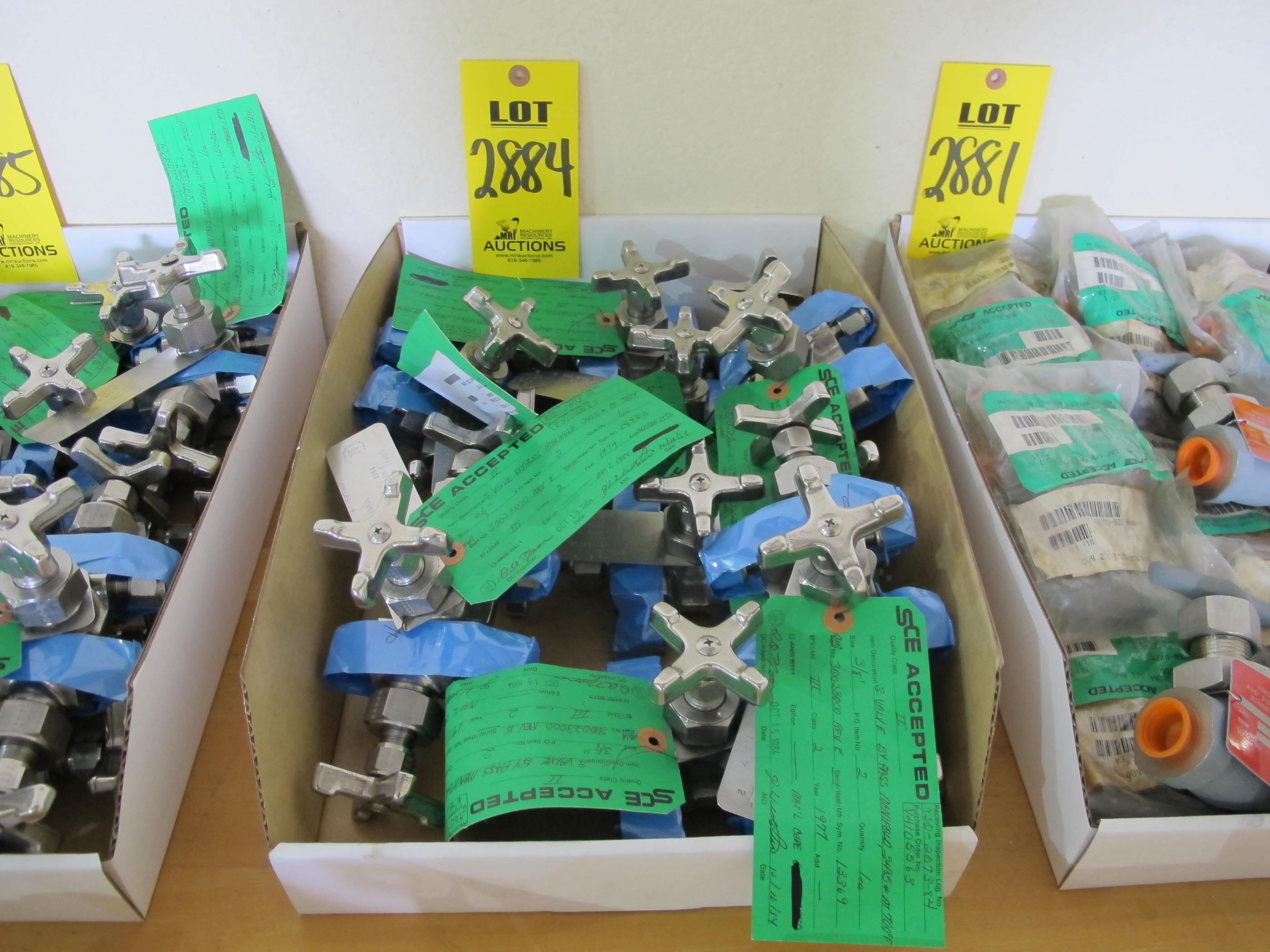 LOT (9) VALVES, MANIFOLD TYPE, 3/8" SIZE, 2485 LB/700 DEGREE F RATING, 316 SS MATERIAL, COMPRESSION CONNECTIONS, A182 SPECIFICATION, 4-WAY STYLE, HANDWHEEL OPERATOR. MARK 856. PART # 30023000 (W-51) LOADING & HANDLING FEE $5-